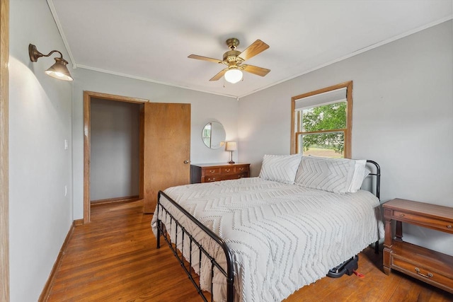 N3504 State Rd 80, Elroy, WI 53929 - bedroom featuring crown molding, wood finished floors, ceiling fan, and baseboards