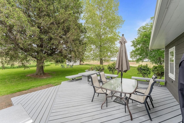 N3504 State Rd 80, Elroy, WI 53929 - wooden deck with a lawn and outdoor dining space
