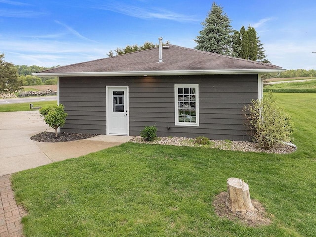 N3504 State Rd 80, Elroy, WI 53929 - back of house with a yard and roof with shingles