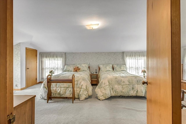 1416 Lake Dr, South Milwaukee, WI 53172 - carpeted bedroom featuring multiple windows and vaulted ceiling