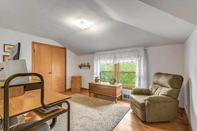 1416 Lake Dr, South Milwaukee, WI 53172 - home office with vaulted ceiling, light wood finished floors, and baseboards