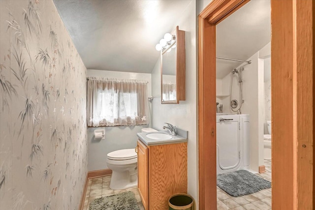 1416 Lake Dr, South Milwaukee, WI 53172 - full bathroom featuring toilet, vanity, a shower, tile patterned floors, and vaulted ceiling