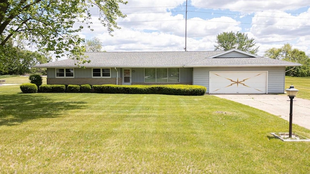 3023 Park Ave, Beloit, WI 53511 - ranch-style house featuring a front lawn, a garage, concrete driveway, and roof with shingles