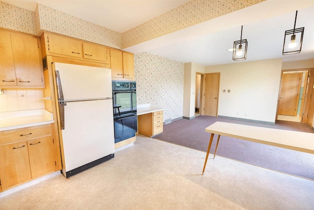 3023 Park Ave, Beloit, WI 53511 - kitchen with freestanding refrigerator, open floor plan, decorative backsplash, light countertops, and light brown cabinetry