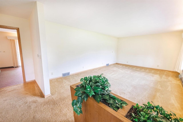 3023 Park Ave, Beloit, WI 53511 - carpeted spare room featuring baseboards