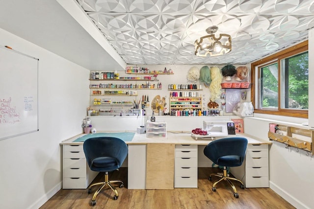 3604 Glenn Ln, Middleton, WI 53562 - office space featuring light wood-style flooring, an ornate ceiling, and built in desk