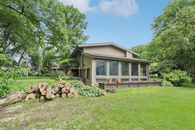 3604 Glenn Ln, Middleton, WI 53562 - back of property featuring a sunroom and a yard
