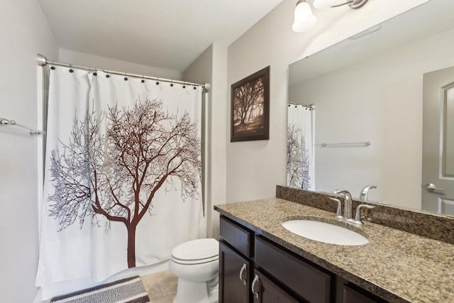 417 Champlain Dr, Johnson Creek, WI 53038 - bathroom with vanity, toilet, tile patterned floors, and a shower with shower curtain