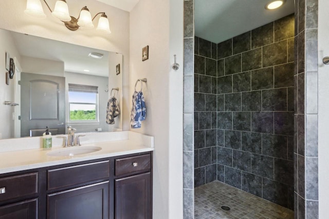 417 Champlain Dr, Johnson Creek, WI 53038 - bathroom featuring vanity and a tile shower