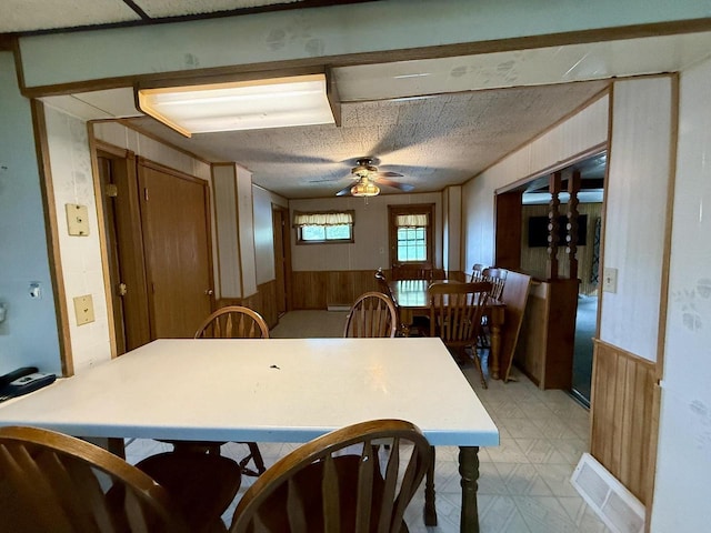 105 Cliff St, Camp Douglas, WI 54618 - dining area with ceiling fan and wooden walls