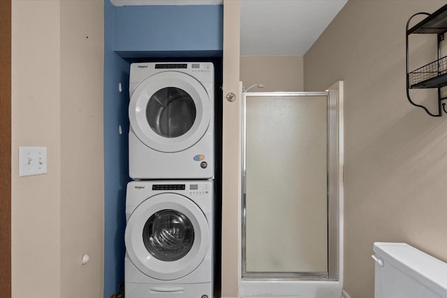514 Root Ave Unit D, Hartford, WI 53027 - laundry area featuring stacked washing machine and dryer