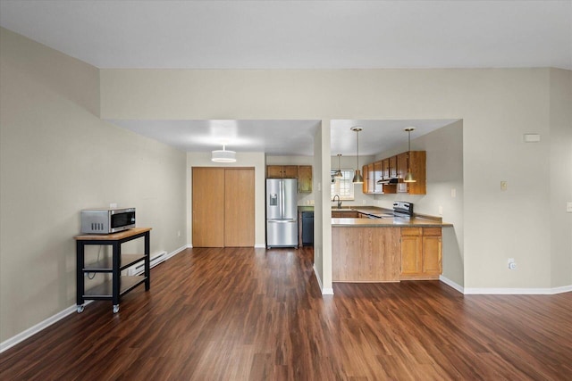 514 Root Ave Unit D, Hartford, WI 53027 - kitchen with appliances with stainless steel finishes, dark wood-type flooring, baseboards, and a sink