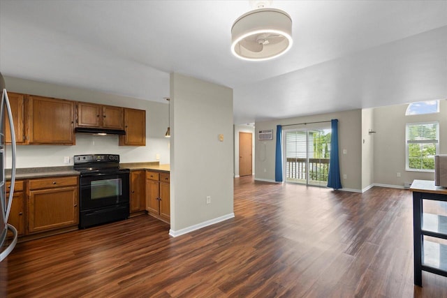 514 Root Ave Unit D, Hartford, WI 53027 - kitchen with electric range, under cabinet range hood, open floor plan, and brown cabinetry
