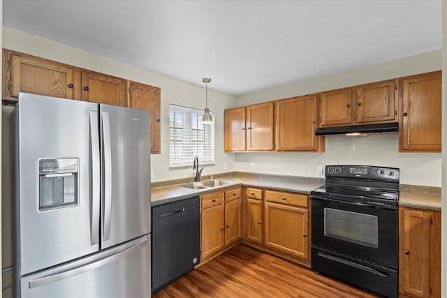 514 Root Ave Unit D, Hartford, WI 53027 - kitchen featuring stainless steel fridge with ice dispenser, black range with electric stovetop, dishwasher, under cabinet range hood, and a sink