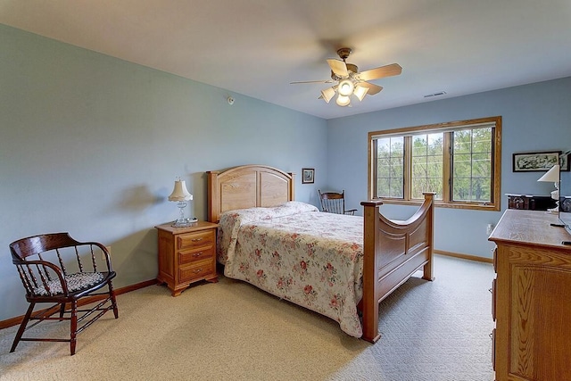 211 Oconomowoc Pkwy, Oconomowoc, WI 53066 - bedroom featuring light colored carpet, baseboards, and ceiling fan