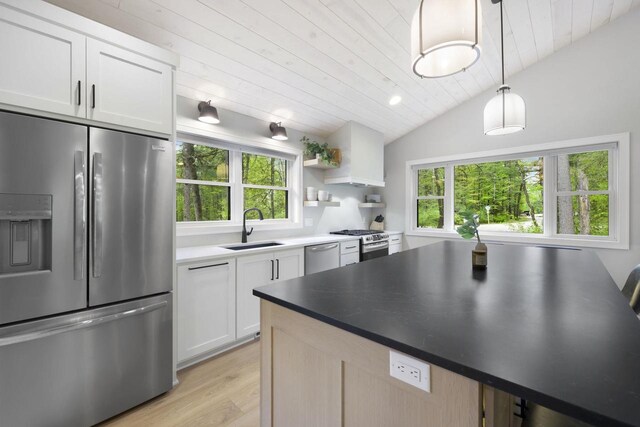 W2434 Timber Trl, Keshena, WI 54135 - kitchen with appliances with stainless steel finishes, a sink, light wood-type flooring, wood ceiling, and white cabinetry