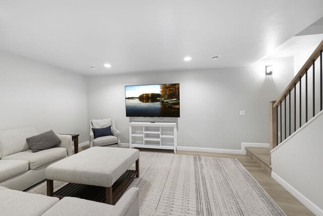 W2434 Timber Trl, Keshena, WI 54135 - living room with recessed lighting, baseboards, stairway, and light wood finished floors