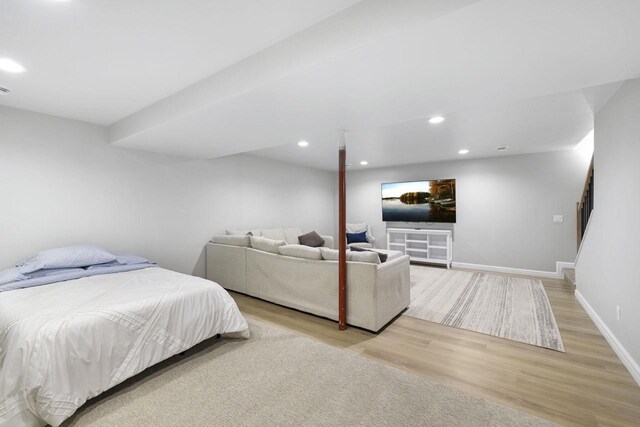 W2434 Timber Trl, Keshena, WI 54135 - bedroom with light wood-style flooring, baseboards, and recessed lighting