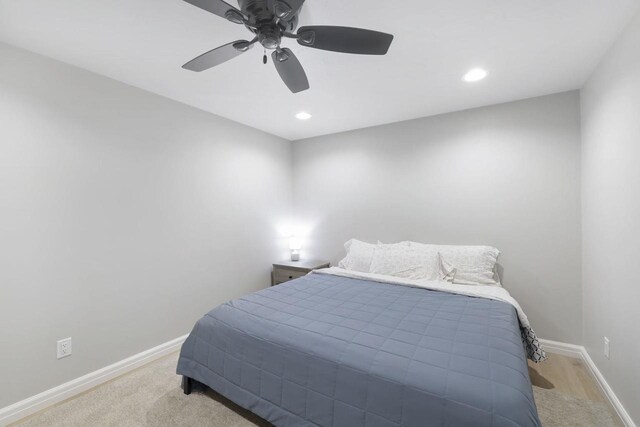 W2434 Timber Trl, Keshena, WI 54135 - bedroom featuring baseboards, ceiling fan, recessed lighting, and light carpet