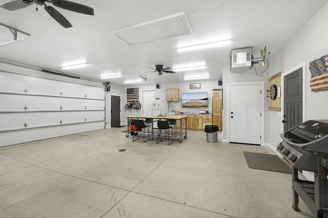 W2434 Timber Trl, Keshena, WI 54135 - garage with a ceiling fan and freestanding refrigerator