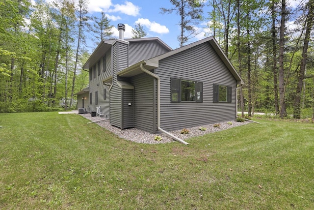 W2434 Timber Trl, Keshena, WI 54135 - view of side of property with a lawn
