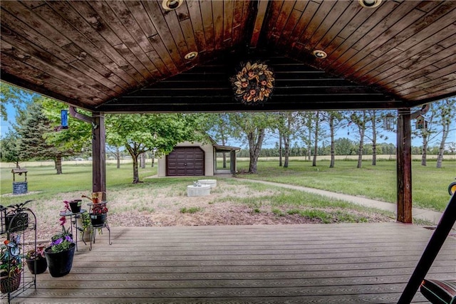 E5777 689th Ave, Menomonie, WI 54751 - deck featuring a lawn and an outbuilding