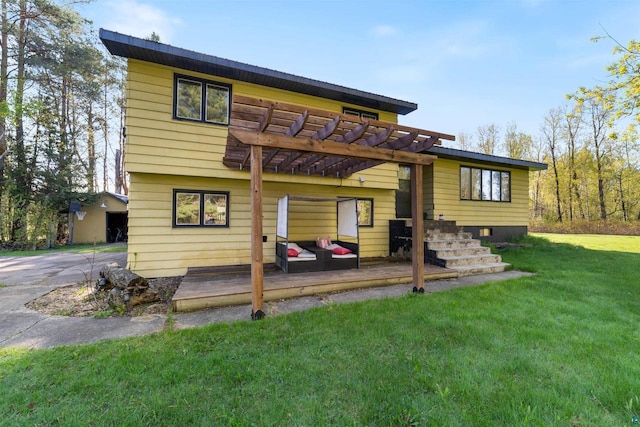3910 E Koenig Rd, Superior, WI 54880 - back of house featuring a pergola, a lawn, outdoor lounge area, and a patio area