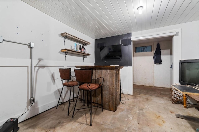 3910 E Koenig Rd, Superior, WI 54880 - indoor dry bar with unfinished concrete floors and wooden ceiling