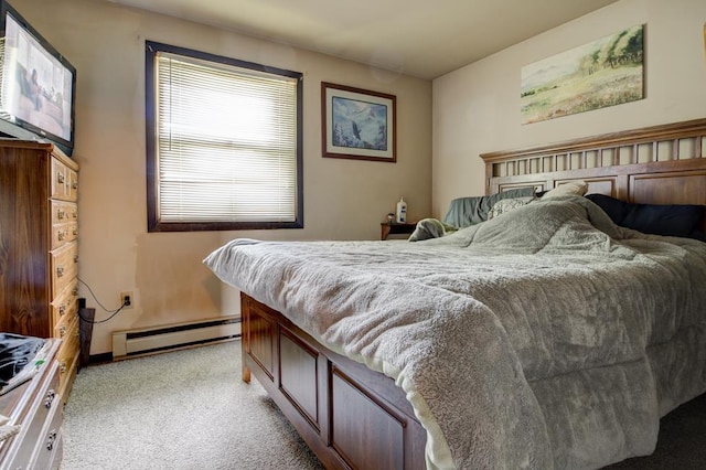 129 Luby Ave, Oconto, WI 54153 - bedroom featuring a baseboard heating unit, light colored carpet, and baseboards