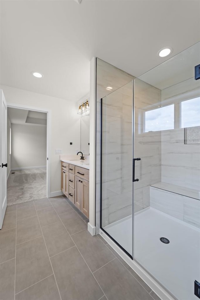 727 Schubert St, Verona, WI 53593 - full bathroom with vanity, a shower stall, recessed lighting, and tile patterned floors