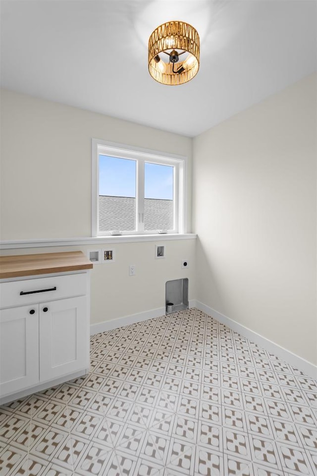 727 Schubert St, Verona, WI 53593 - washroom featuring hookup for an electric dryer, hookup for a washing machine, cabinet space, and baseboards