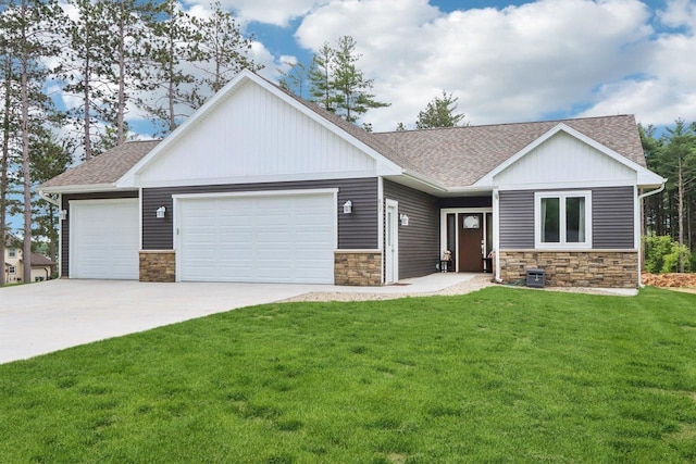 807 W Saddle Rdg Unit 807, Portage, WI 53901 - view of front of home with roof with shingles, stone siding, and a garage