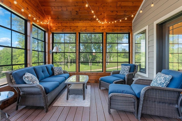 E12603 Bay Rd, Merrimac, WI 53561 - sunroom / solarium featuring rail lighting, an outdoor hangout area, and vaulted ceiling