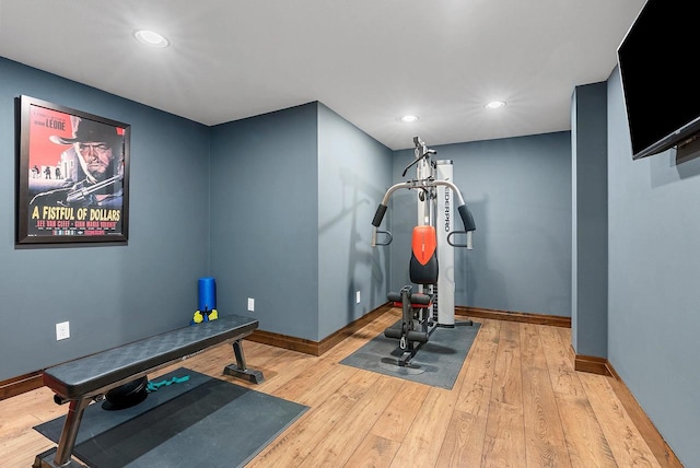 E12603 Bay Rd, Merrimac, WI 53561 - workout room featuring baseboards, wood finished floors, and recessed lighting
