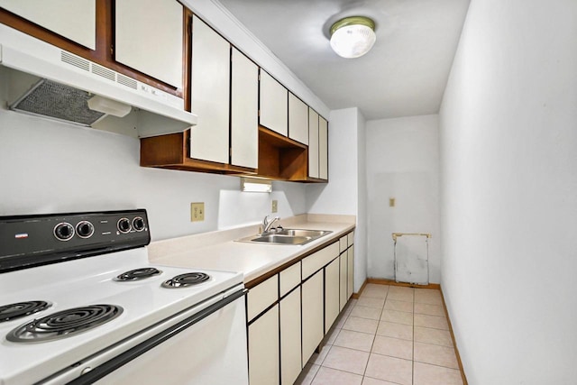 1923 Sherman Ave, Madison, WI 53704 - kitchen featuring white electric stove, a sink, under cabinet range hood, light countertops, and light tile patterned floors
