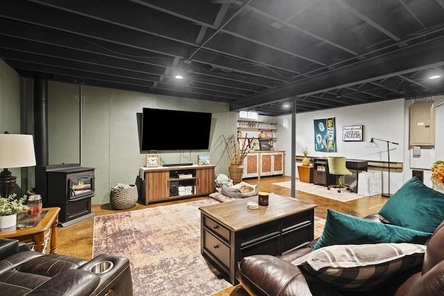 1115 Daniel Ct Unit 40, Neenah, WI 54956 - living area featuring a wood stove and electric panel