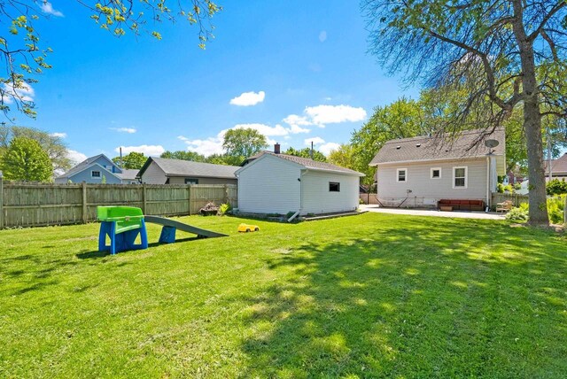 816 W Oklahoma St, Appleton, WI 54914 - view of yard with a patio