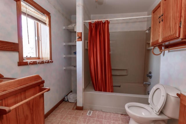 302 W Division St, Fond Du Lac, WI 54935 - bathroom with shower / tub combo, toilet, and baseboards