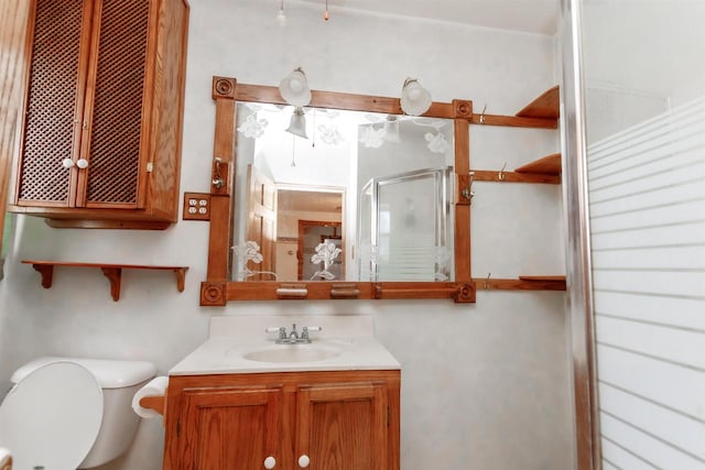 302 W Division St, Fond Du Lac, WI 54935 - bathroom with vanity, toilet, and a stall shower