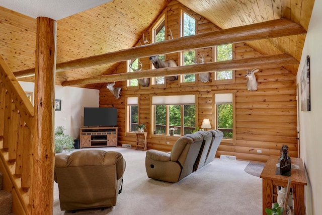 N17795 Trim Rd, Galesville, WI 54630 - living room featuring carpet flooring, rustic walls, stairway, wooden ceiling with exposed beams, and high vaulted ceiling