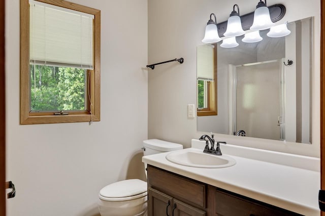 N17795 Trim Rd, Galesville, WI 54630 - full bathroom featuring toilet, a shower stall, and vanity