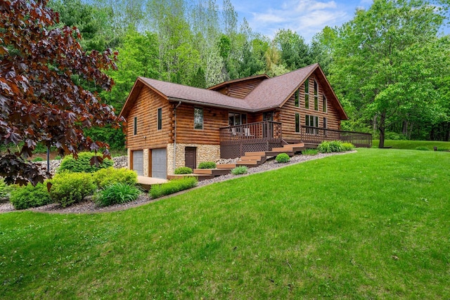 N17795 Trim Rd, Galesville, WI 54630 - cabin featuring log exterior, stone siding, an attached garage, a deck, and a front lawn