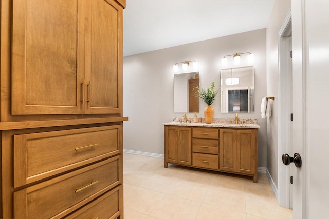 W4825 Wild Wings Dr, Sherwood, WI 54169 - bathroom featuring double vanity, baseboards, and tile patterned floors