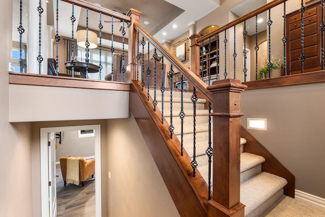 W4825 Wild Wings Dr, Sherwood, WI 54169 - staircase featuring baseboards, recessed lighting, and wood finished floors