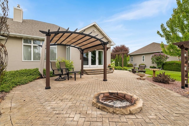 W4825 Wild Wings Dr, Sherwood, WI 54169 - view of patio / terrace featuring a pergola and an outdoor fire pit