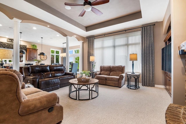 W4825 Wild Wings Dr, Sherwood, WI 54169 - living area featuring decorative columns, a ceiling fan, light colored carpet, arched walkways, and recessed lighting