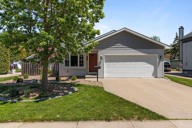 1242 Liberty St, Oshkosh, WI 54901 - ranch-style house with driveway, a garage, and a front lawn
