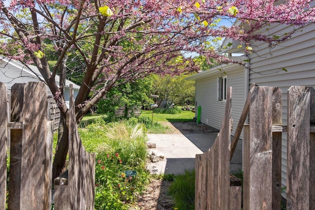 1242 Liberty St, Oshkosh, WI 54901 - view of yard featuring a patio area