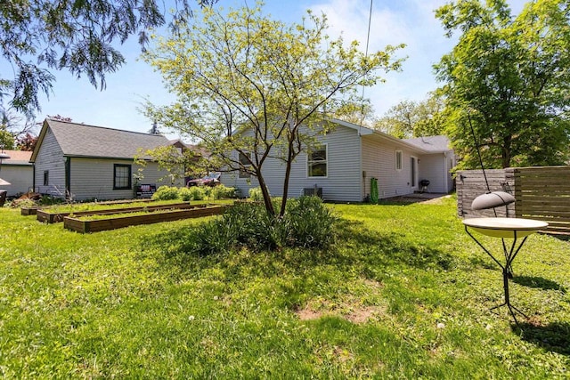 1242 Liberty St, Oshkosh, WI 54901 - view of yard with a garden