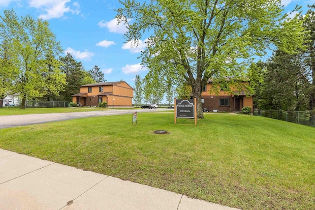521 E Grand Ave, Rosholt, WI 54473 - view of yard featuring curved driveway
